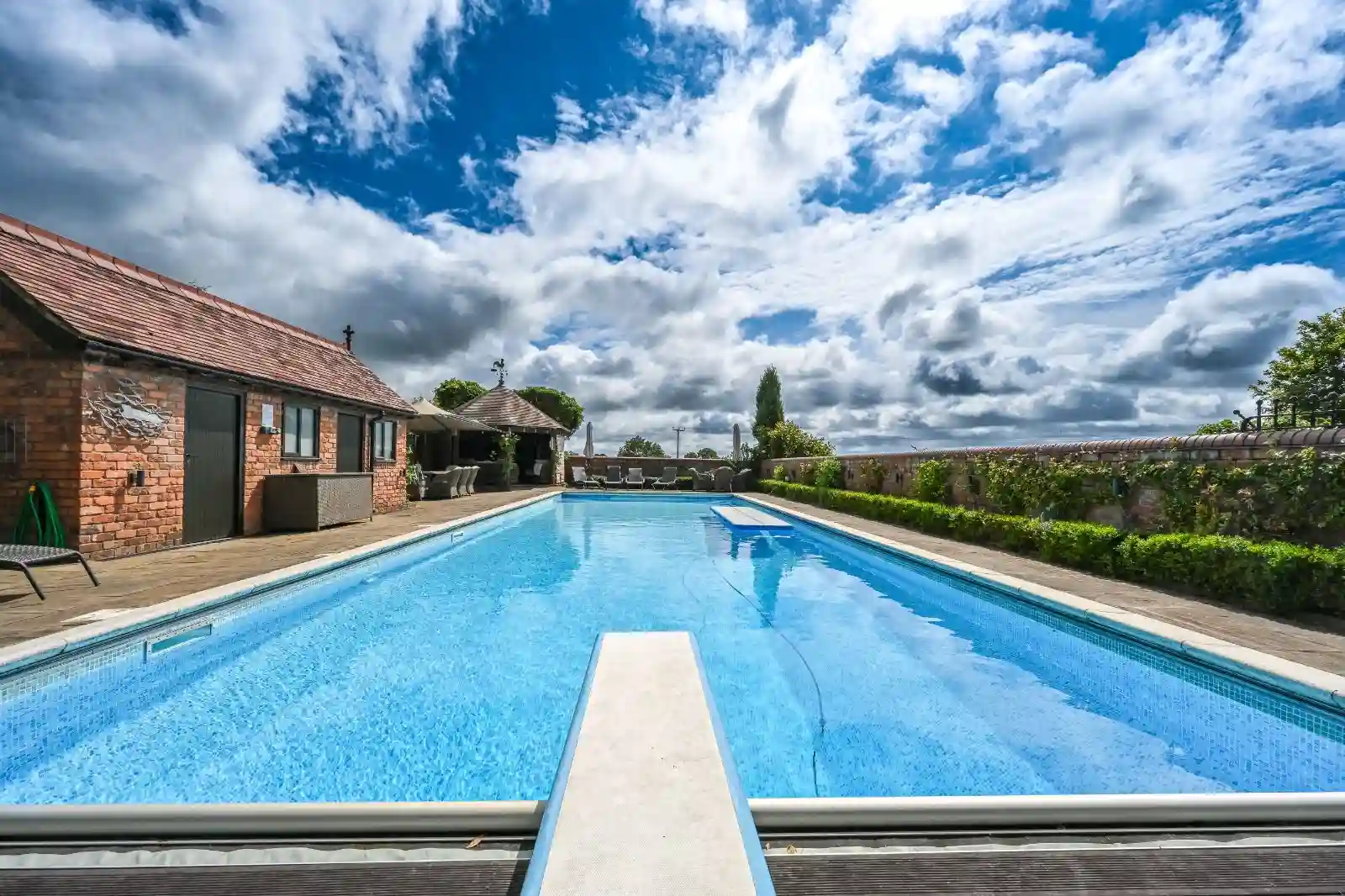 The heated outdoor salt-water pool and sun deck at The Old Rectory